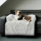 Plush Couch Cover: dog resting on the bed