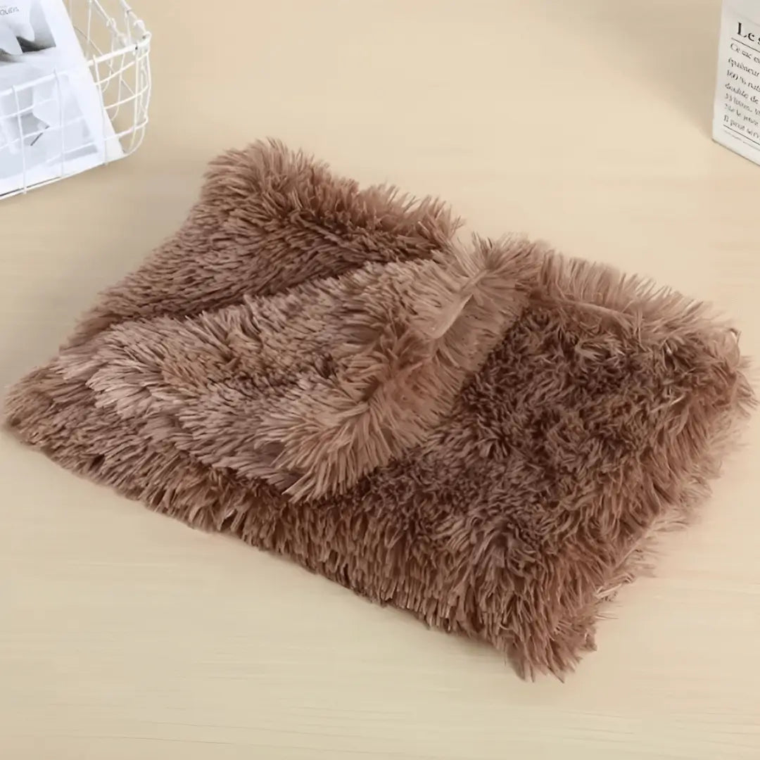 Calming Plush Pet Blanket: dog resting on the bed