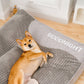 Calming Dog Cushion Bed: bed in a living room setting